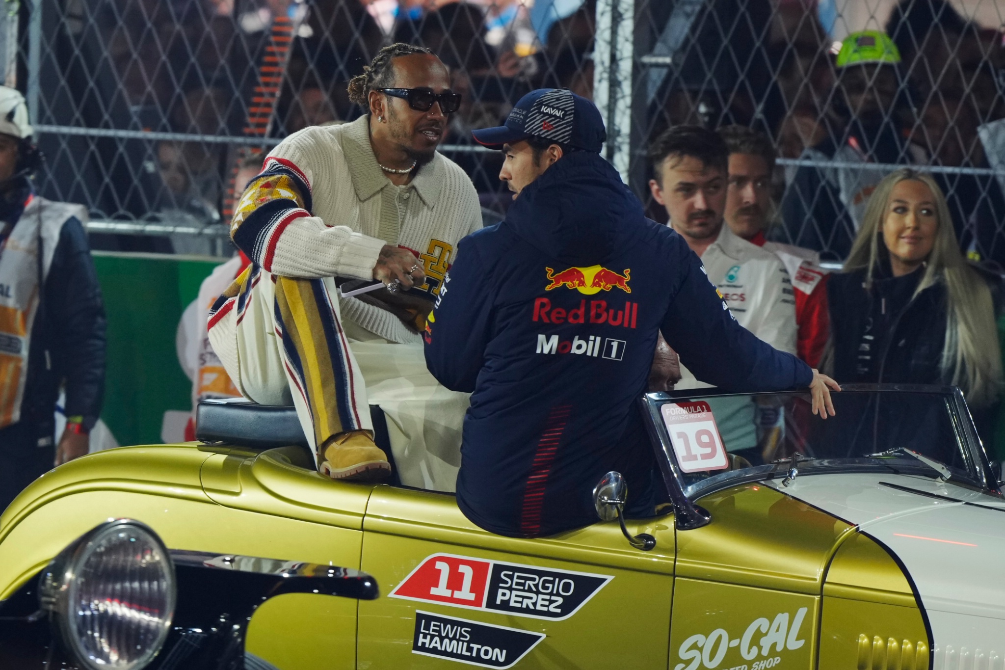 (L to R): Lewis Hamilton (GBR) Mercedes AMG F1 with Sergio Perez (MEX) Red Bull Racing on the drivers' parade. Formula 1