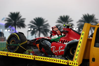 The Ferrari SF-23 of Carlos Sainz Jr (ESP) Ferrari is recovered back to the pits on the back of a truck after he crashed in