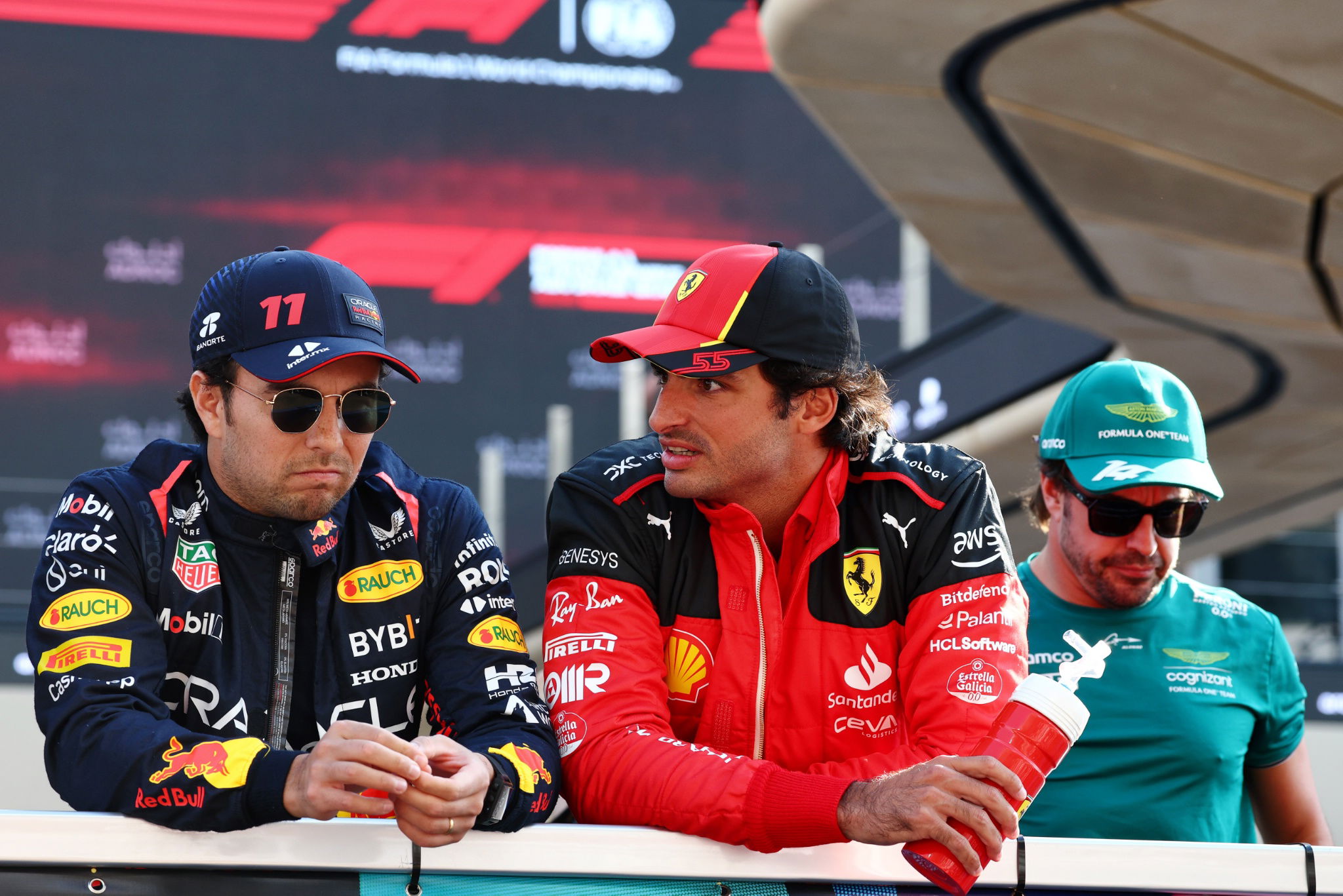 (L to R): Sergio Perez (MEX) Red Bull Racing Carlos Sainz Jr (ESP) Ferrari on the drivers' parade. Formula 1 World