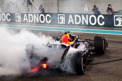 Race winner Max Verstappen (NLD) Red Bull Racing RB19 celebrates with doughnuts at the end of the race in parc ferme.