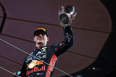 Race winner Max Verstappen (NLD) Red Bull Racing celebrates on the podium. Formula 1 World Championship, Rd 23, Abu Dhabi