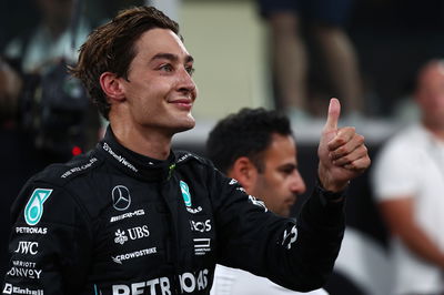 George Russell (GBR) Mercedes AMG F1 celebrates his third position in parc ferme. Formula 1 World Championship, Rd 23, Abu