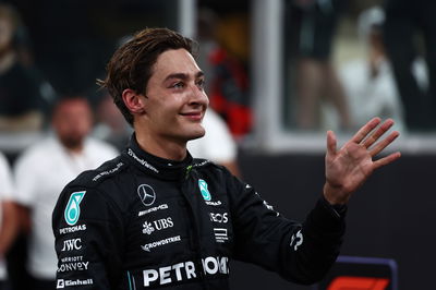 George Russell (GBR) Mercedes AMG F1 celebrates his third position in parc ferme. Formula 1 World Championship, Rd 23, Abu