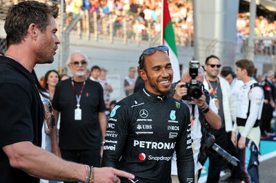 (L to R): Liam Hemsworth (AUS) Actor with Lewis Hamilton (GBR) Mercedes AMG F1 on the grid. Formula 1 World Championship,