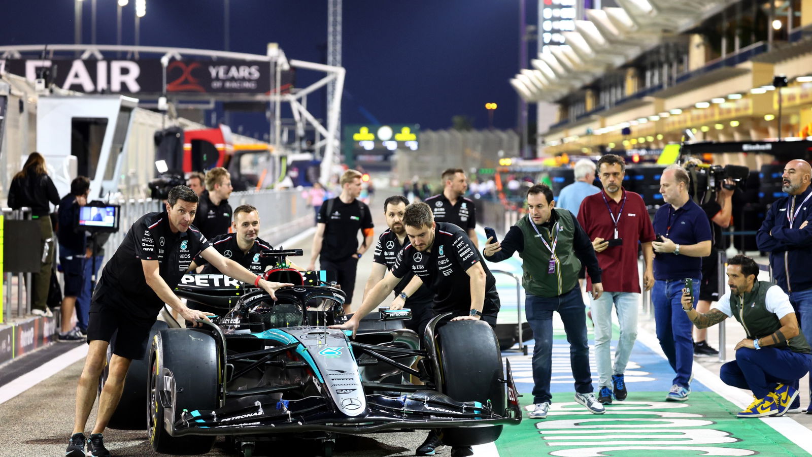 Mercedes AMG F1 W15 of George Russell (GBR) pushed down the pit lane by mechanics. Formula 1 World Championship, Rd 1,