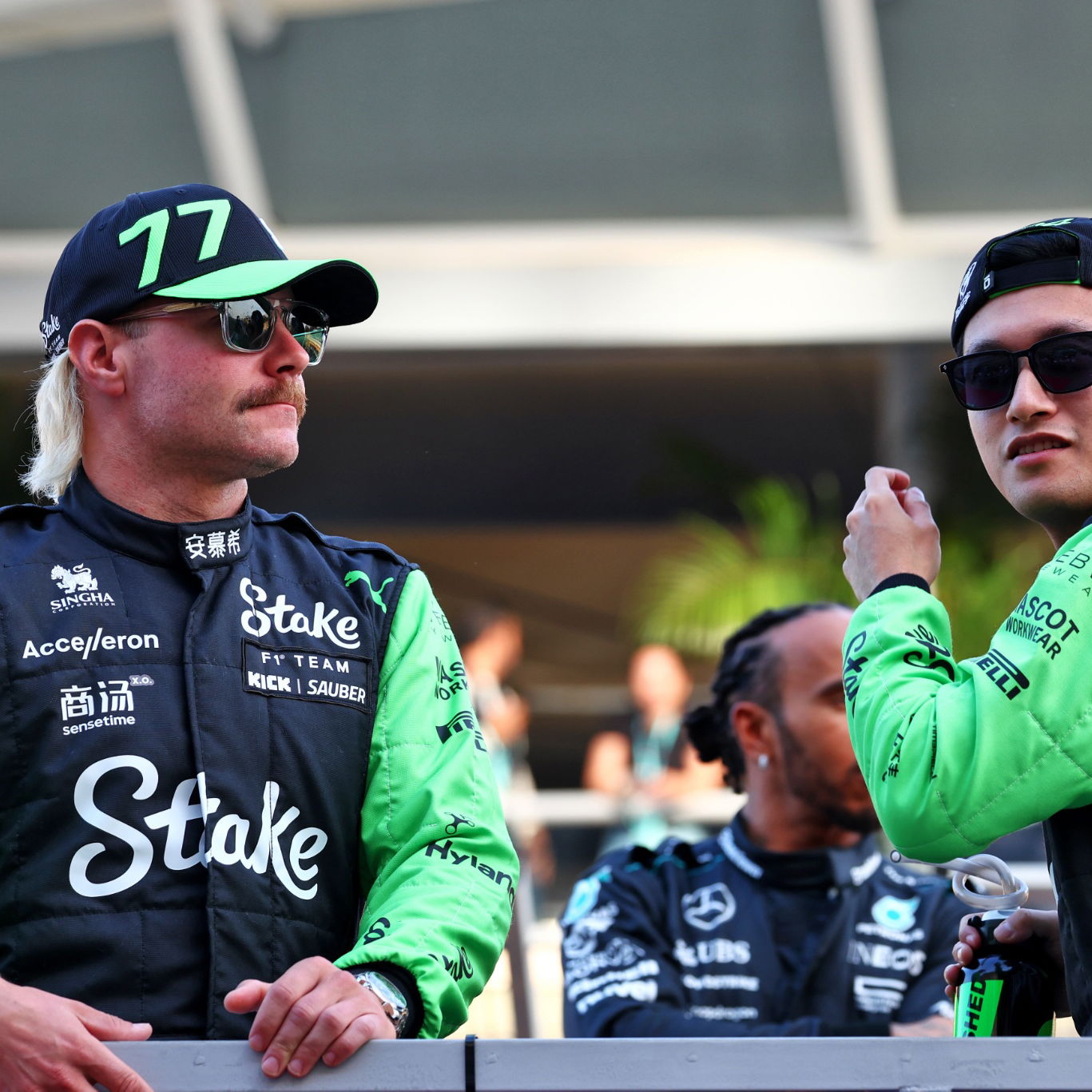 (L to R): Valtteri Bottas (FIN) Sauber with team mate Zhou Guanyu (CHN) Sauber on the drivers' parade. Formula 1 World