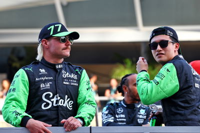 (L to R): Valtteri Bottas (FIN) Sauber with team mate Zhou Guanyu (CHN) Sauber on the drivers' parade. Formula 1 World