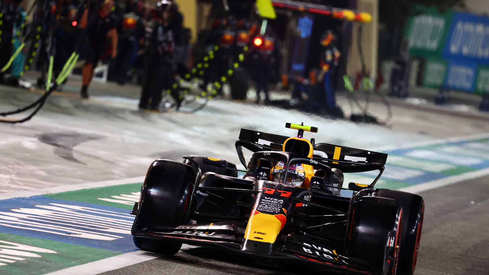 Sergio Perez (MEX) Red Bull Racing RB20 leaves the pits. Formula 1 World Championship, Rd 1, Bahrain Grand Prix, Sakhir,