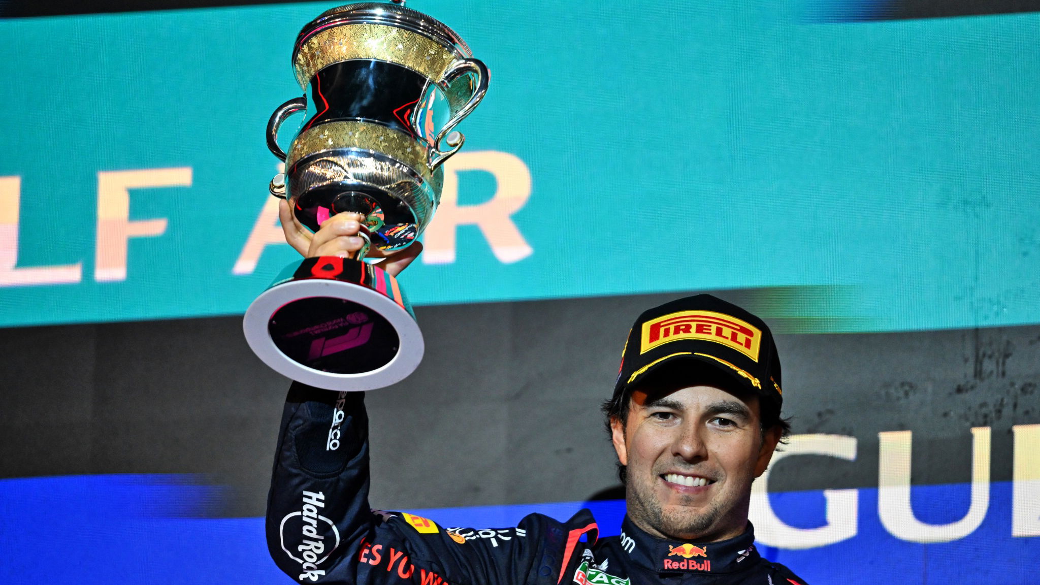 Sergio Perez (MEX) Red Bull Racing celebrates his second on the podium. Formula 1 World Championship, Rd 1, Bahrain Grand
