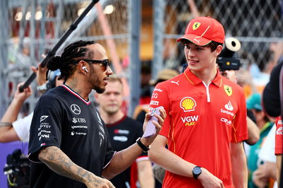 (L to R): Lewis Hamilton (GBR) Mercedes AMG F1 and Oliver Bearman (GBR) Ferrari Reserve Driver on the drivers' parade.