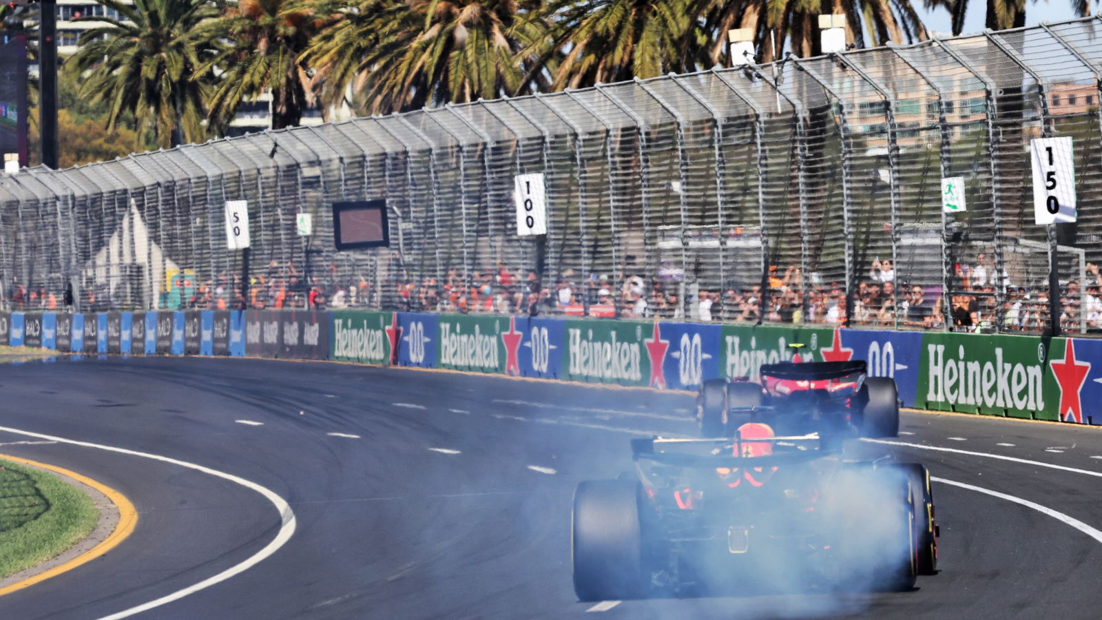 Max Verstappen (NLD) Red Bull Racing RB20 with a smoking rear brake that led to his retirement. Formula 1 World