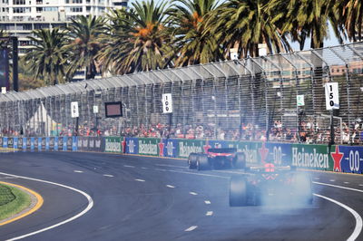 Max Verstappen (NLD) Red Bull Racing RB20 with a smoking rear brake that led to his retirement. Formula 1 World