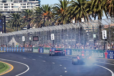 Max Verstappen (NLD) Red Bull Racing RB20 with a smoking rear brake that led to his retirement. Formula 1 World