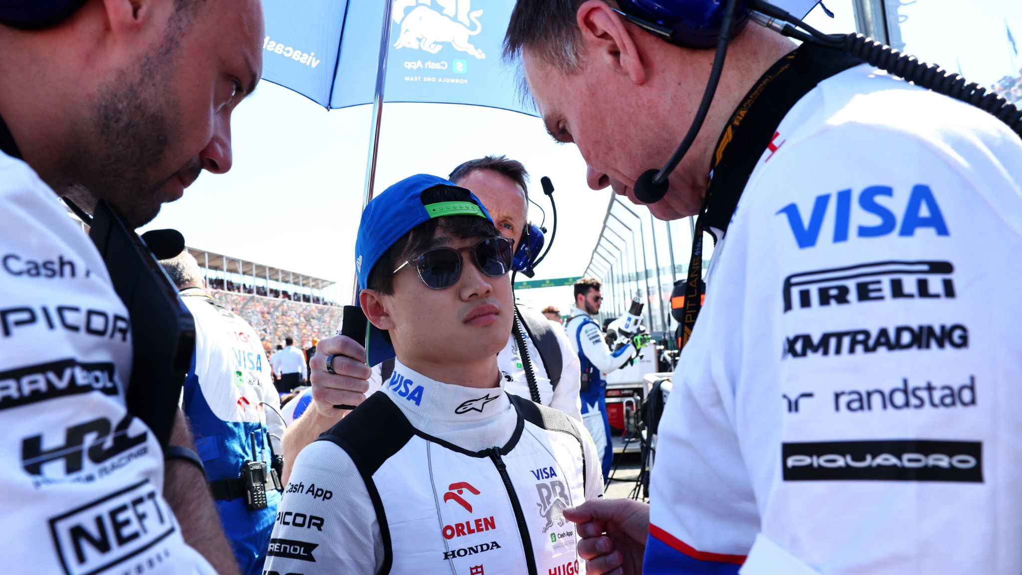 Yuki Tsunoda (JPN) RB with Alan Permane (GBR) RB Sporting Director on the grid. Formula 1 World Championship, Rd 3,