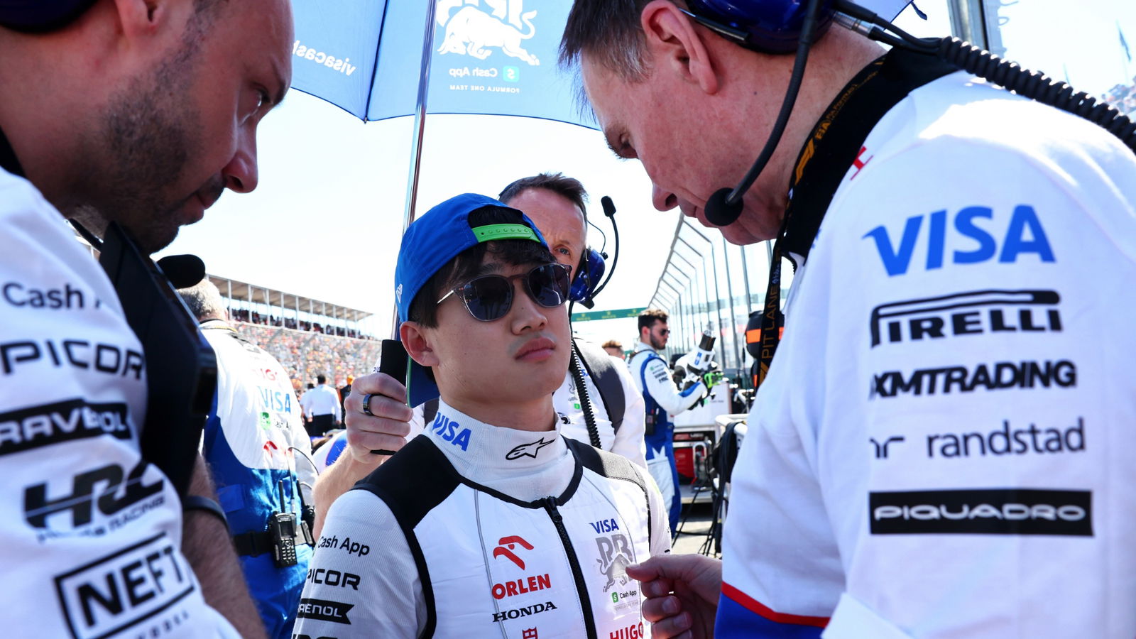 Yuki Tsunoda (JPN) RB with Alan Permane (GBR) RB Sporting Director on the grid. Formula 1 World Championship, Rd 3,