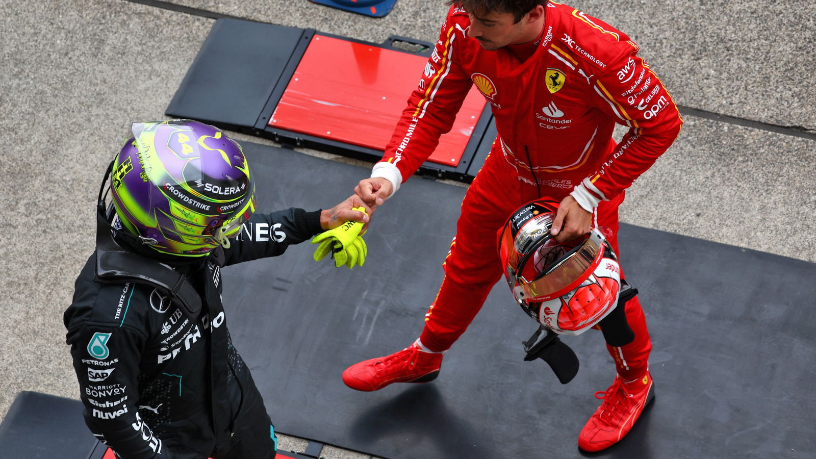 Lewis Hamilton (GBR) Mercedes AMG F1 and Charles Leclerc (MON) Ferrari in qualifying parc ferme. Formula 1 World