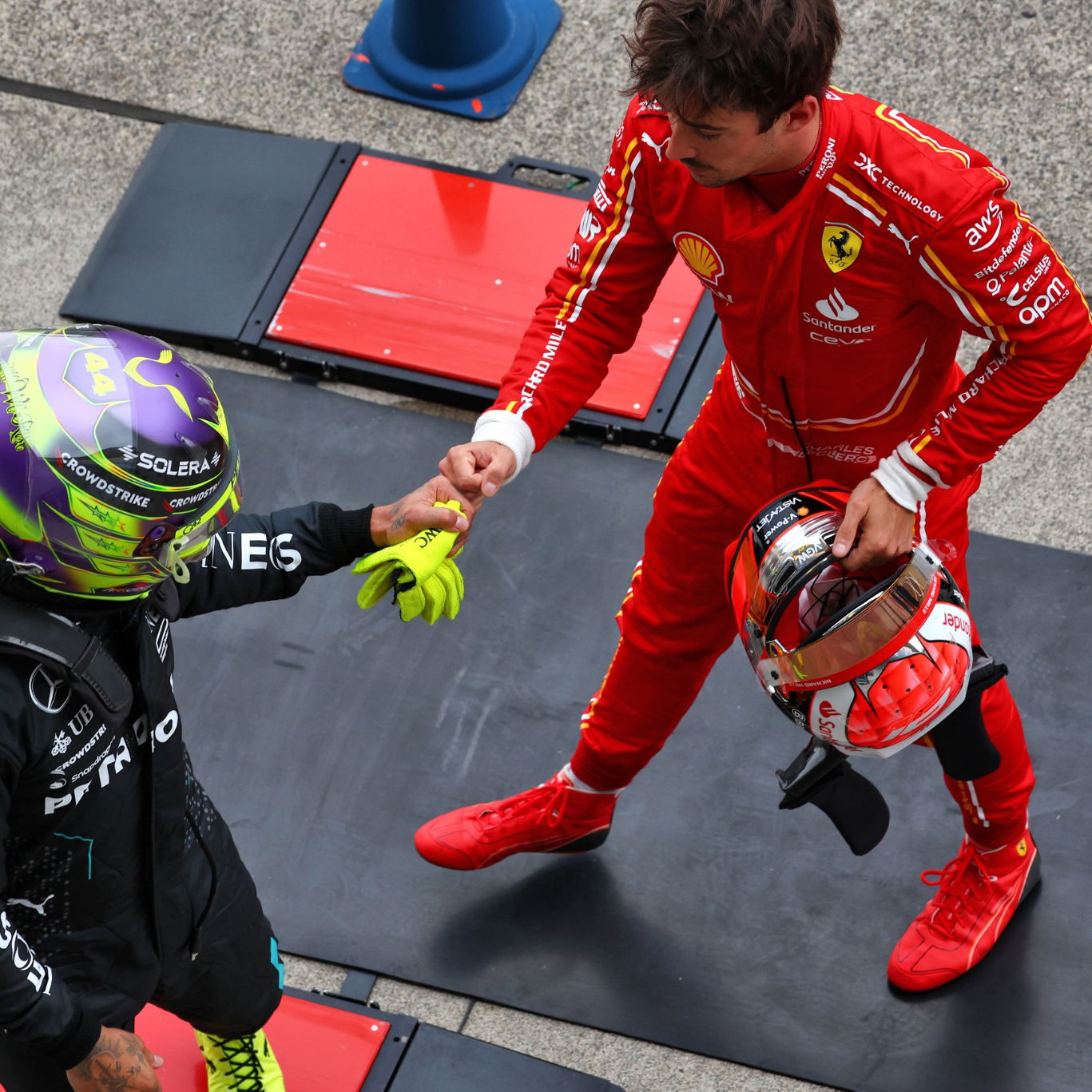 Lewis Hamilton (GBR) Mercedes AMG F1 and Charles Leclerc (MON) Ferrari in qualifying parc ferme. Formula 1 World