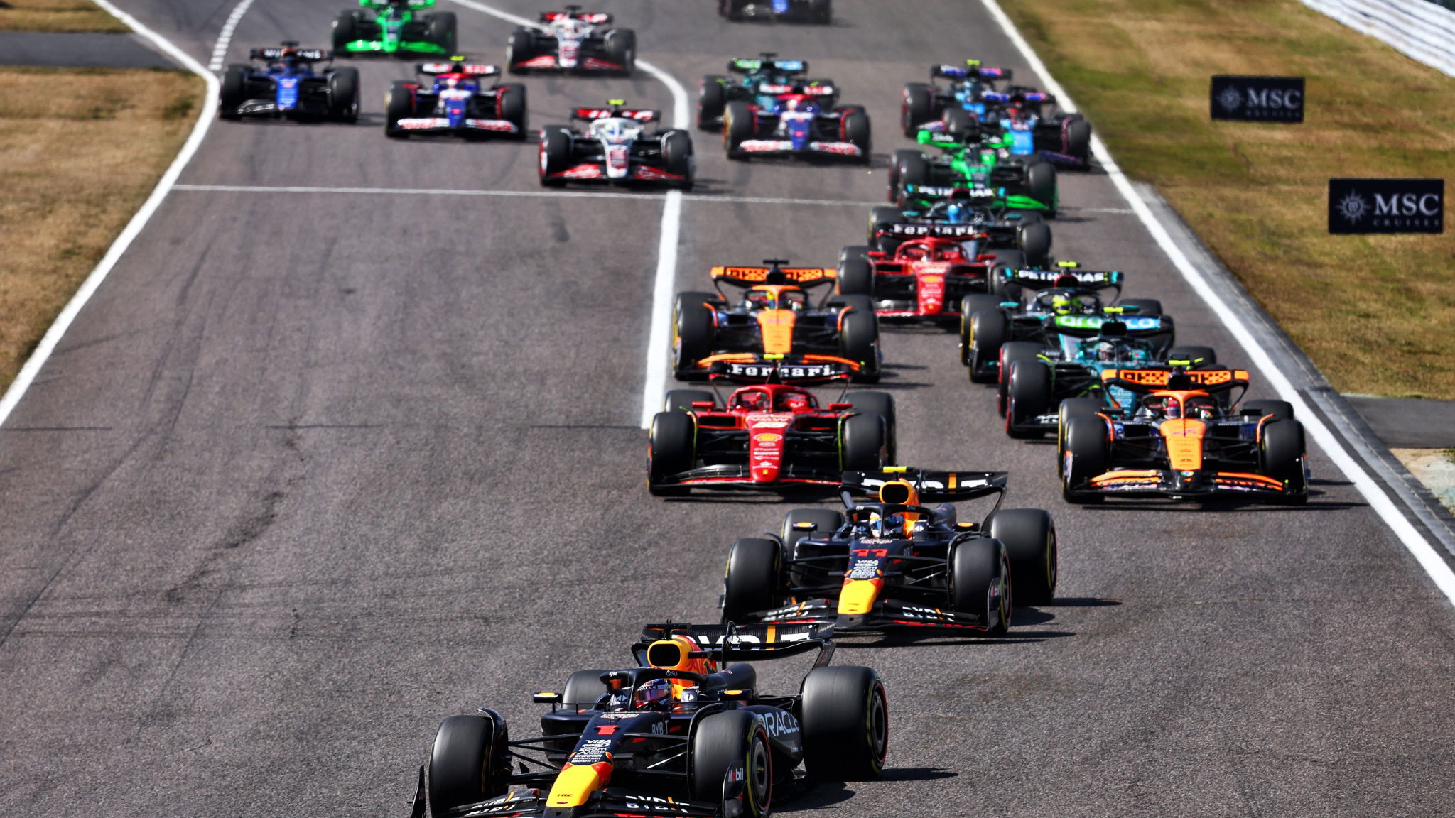 Max Verstappen (NLD) Red Bull Racing RB20 leads at the start of the race. Formula 1 World Championship, Rd 4, Japanese