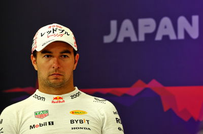 Sergio Perez (MEX) Red Bull Racing, in the post race FIA Press Conference. Formula 1 World Championship, Rd 4, Japanese