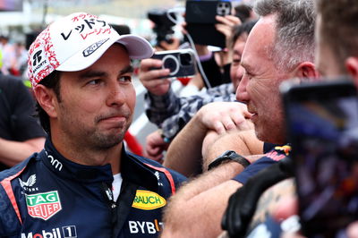 Second placed Sergio Perez (MEX) Red Bull Racing with Christian Horner (GBR) Red Bull Racing Team Principal in parc ferme.