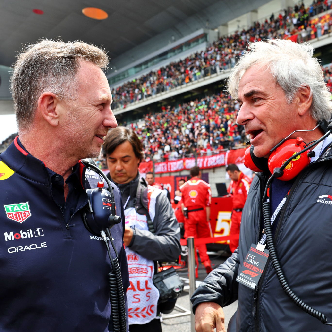 (L to R): Christian Horner (GBR) Red Bull Racing Team Principal with Carlos Sainz (ESP) on the grid. Formula 1 World