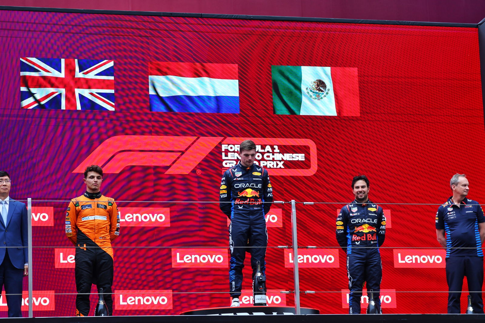 The podium (L to R): Lando Norris (GBR) McLaren, second; Max Verstappen (NLD) Red Bull Racing, race winner; Sergio Perez