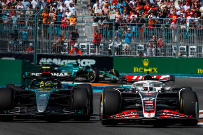 (L to R): Lewis Hamilton (GBR) Mercedes AMG F1 W15 and Nico Hulkenberg (GER) Haas VF-24 battle for position. Formula 1