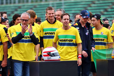 (L to R): Stefano Domenicali (ITA) Formula One President and CEO; Sebastian Vettel (GER) - Drivers and team personnel -