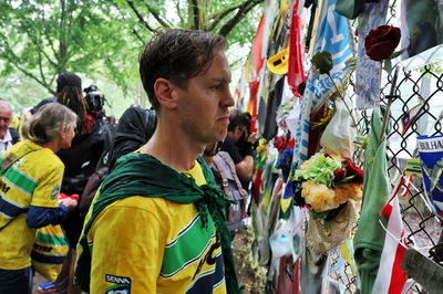 Sebastian Vettel (GER) leads a tribute run for Ayrton Senna and Roland Ratzenberger. Formula 1 World Championship, Rd 7,