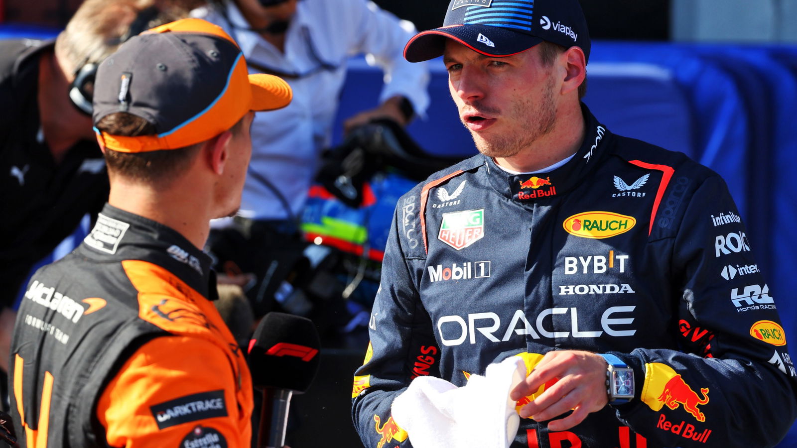 (L to R): Third placed Lando Norris (GBR) McLaren in qualifying parc ferme with pole sitter Max Verstappen (NLD) Red Bull