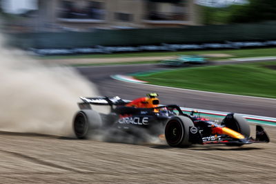 Sergio Perez (MEX) Red Bull Racing RB20 runs wide. Formula 1 World Championship, Rd 7, Emilia Romagna Grand Prix, Imola,