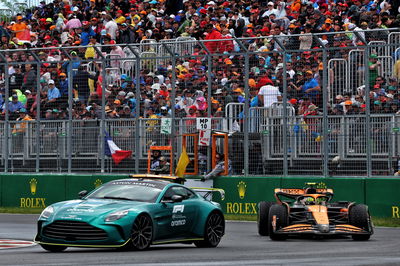 Lando Norris (GBR) McLaren MCL38 leads behind the Aston Martin FIA Safety Car. Formula 1 World Championship, Rd 9,