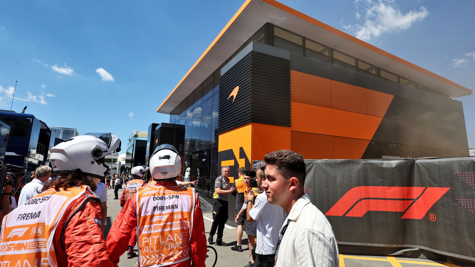 A fire in the McLaren motorhome is tended to by fire fighters. Formula 1 World Championship, Rd 10, Spanish Grand Prix,