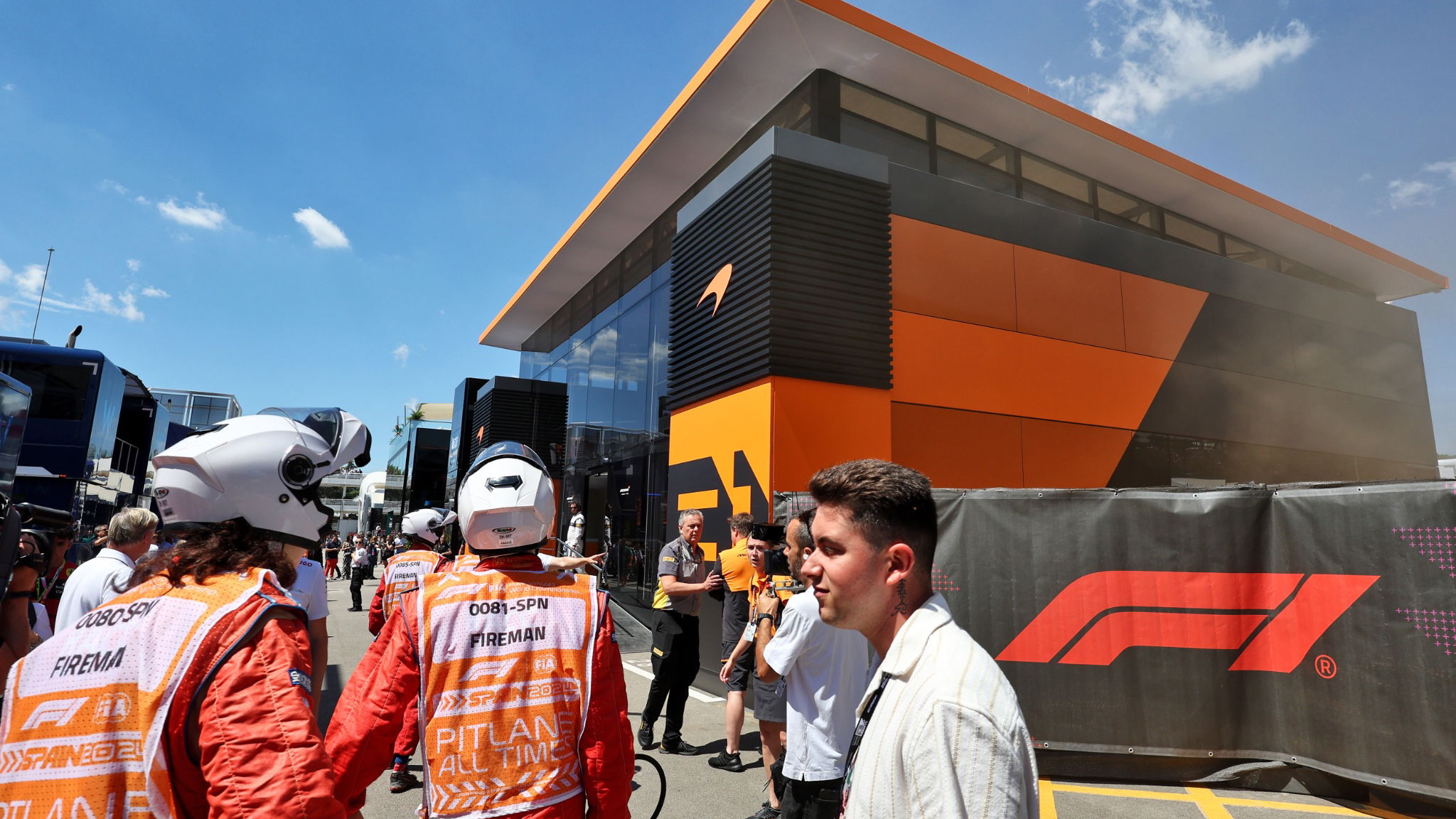 A fire in the McLaren motorhome is tended to by fire fighters. Formula 1 World Championship, Rd 10, Spanish Grand Prix,
