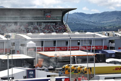 McLaren motorhome in the paddock smoking after a fire. Formula 1 World Championship, Rd 10, Spanish Grand Prix, Barcelona,