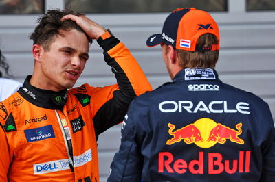 (L to R): Second placed Lando Norris (GBR) McLaren with pole sitter Max Verstappen (NLD) Red Bull Racing in qualifying parc