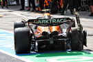 Lando Norris (GBR) McLaren MCL38 makes a pit stop with a puncture after contact with Max Verstappen (NLD) Red Bull Racing