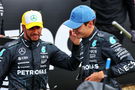 George Russell (GBR) Mercedes AMG F1 celebrates his pole position in qualifying parc ferme with second placed team mate