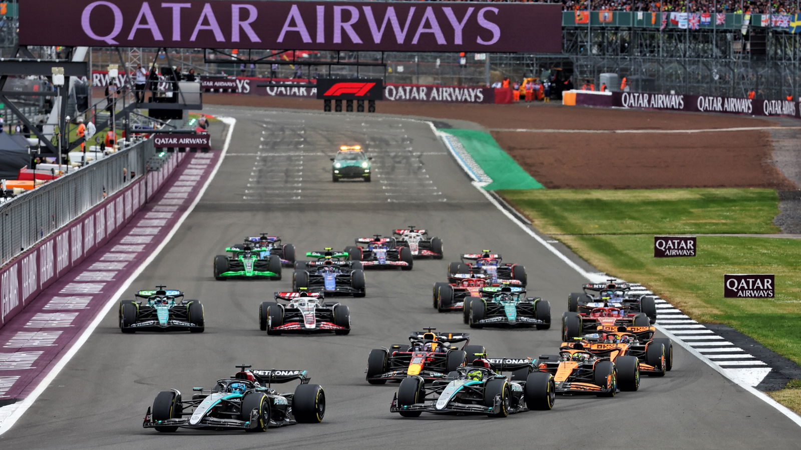 George Russell (GBR) Mercedes AMG F1 W15 leads at the start of the race. Formula 1 World Championship, Rd 12, British