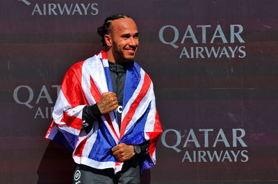 Race winner Lewis Hamilton (GBR) Mercedes AMG F1 celebrates on the podium. Formula 1 World Championship, Rd 12, British