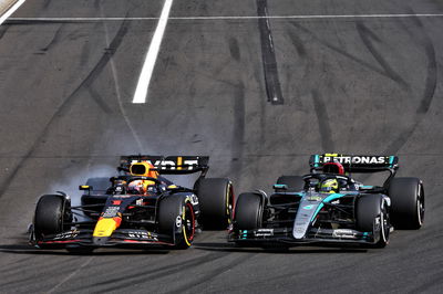 Max Verstappen (NLD) Red Bull Racing RB20 and Lewis Hamilton (GBR) Mercedes AMG F1 W15 collide. Formula 1 World