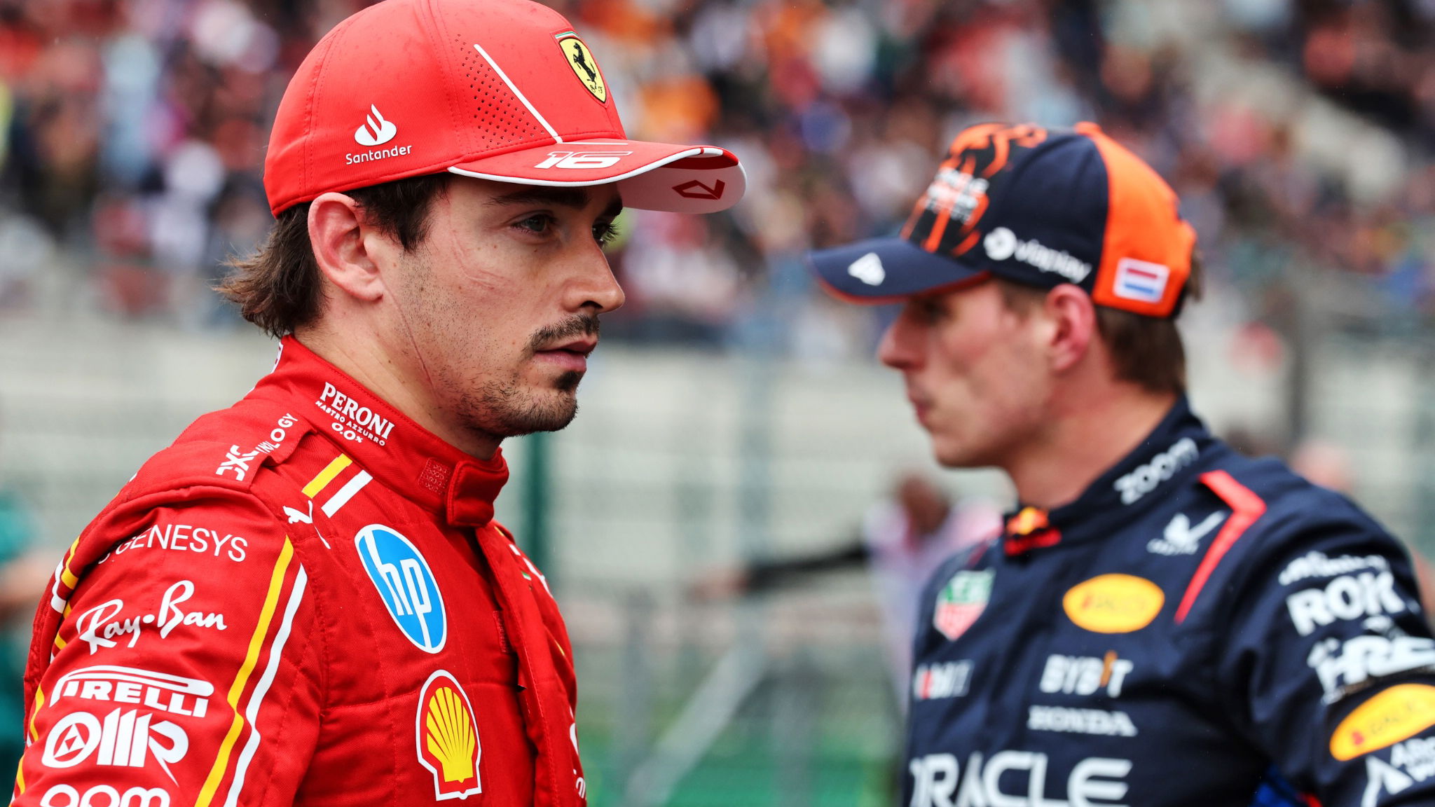 Charles Leclerc (MON) Ferrari and Max Verstappen (NLD) Red Bull Racing in qualifying parc ferme. Formula 1 World