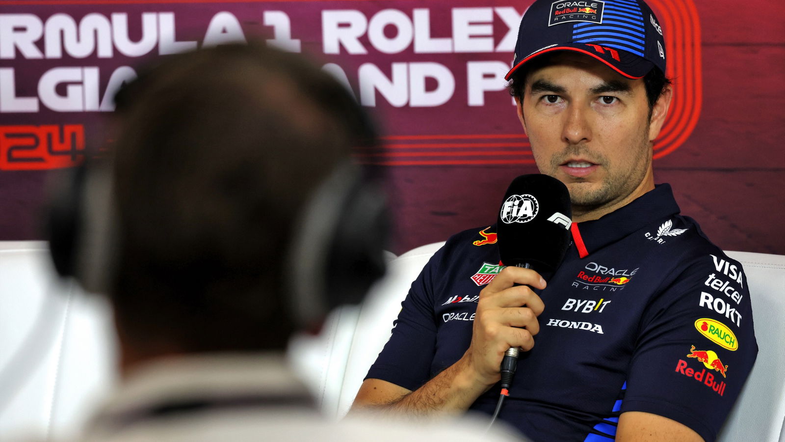 Sergio Perez (MEX) Red Bull Racing in the post qualifying FIA Press Conference. Formula 1 World Championship, Rd 14,