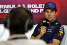 Sergio Perez (MEX) Red Bull Racing in the post qualifying FIA Press Conference. Formula 1 World Championship, Rd 14,