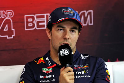 Sergio Perez (MEX) Red Bull Racing in the post qualifying FIA Press Conference. Formula 1 World Championship, Rd 14,