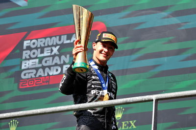 Race winner George Russell (GBR) Mercedes AMG F1 celebrates on the podium. Formula 1 World Championship, Rd 14, Belgian