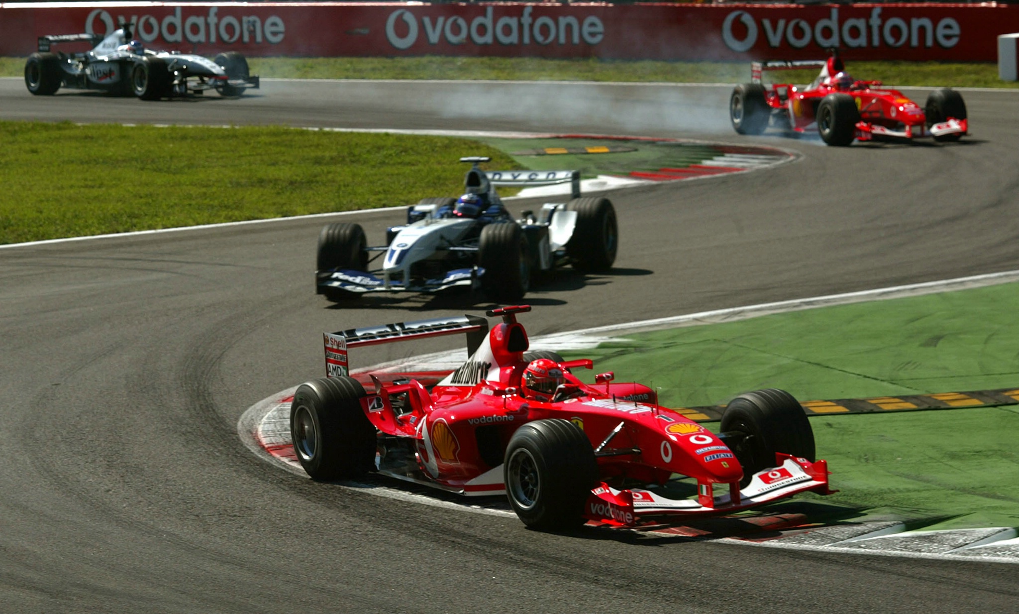Michael Schumacher of Ferrari F1 leads the early laps of the2003 Italian Formula One Grand Prix,