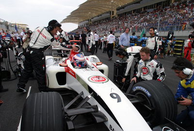 Jenson Button straps in for the 2004 Bahrain Grand Prix