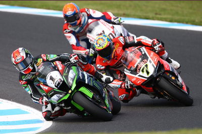 Rea holds his nerve as Davies loses out