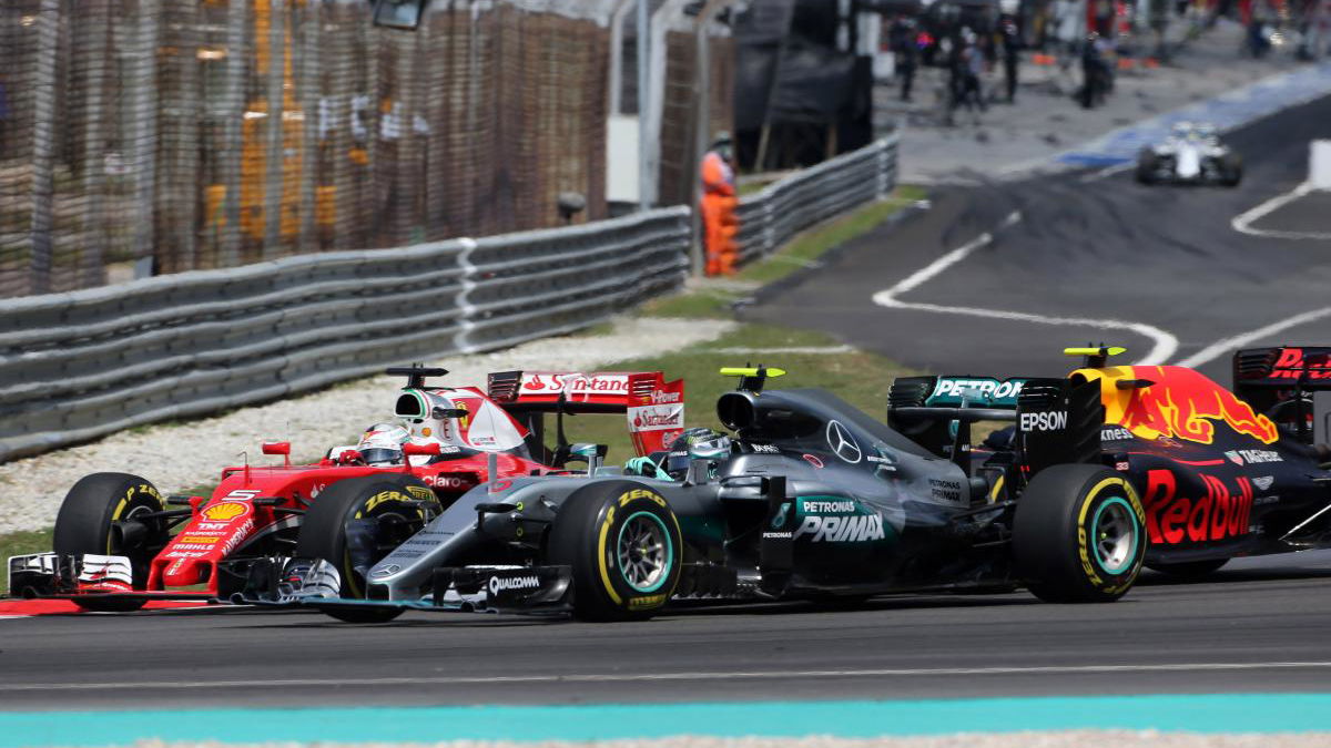 Vettel points finger at Verstappen over Rosberg clash